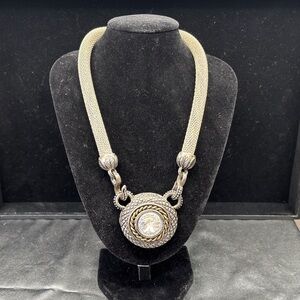 Elegant Silver and Gold Pendant Necklace